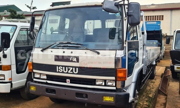 Gura Yakoze Isuzu FTR 850 White Ikamyo i Kampala mu Uganda