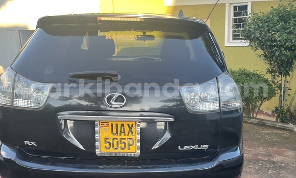 Gura Yakoze Toyota Harrier Black Imodoka i Kampala mu Uganda