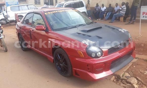 Gura Yakoze Subaru Impreza Red Imodoka i Kampala mu Uganda Gura Yakoze Subaru Impreza Red Imodoka i Kampala mu Uganda