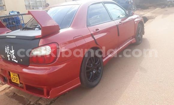 Gura Yakoze Subaru Impreza Red Imodoka i Kampala mu Uganda Gura Yakoze Subaru Impreza Red Imodoka i Kampala mu Uganda