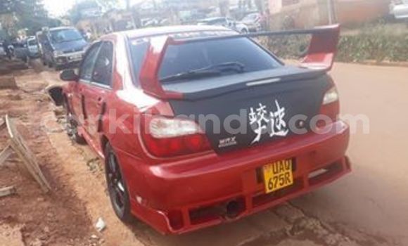 Gura Yakoze Subaru Impreza Red Imodoka i Kampala mu Uganda Gura Yakoze Subaru Impreza Red Imodoka i Kampala mu Uganda