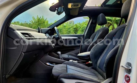 Gura Yakoze BMW X1 White Imodoka i Bombo mu Central Gura Yakoze BMW X1 White Imodoka i Bombo mu Central