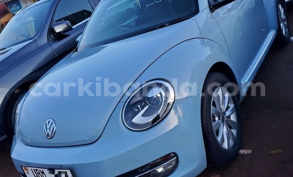 Gura Yakoze Volkswagen Beetle White Imodoka i Bombo mu Central Gura Yakoze Volkswagen Beetle White Imodoka i Bombo mu Central