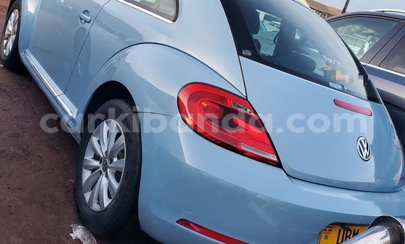 Gura Yakoze Volkswagen Beetle White Imodoka i Bombo mu Central Gura Yakoze Volkswagen Beetle White Imodoka i Bombo mu Central