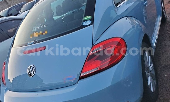 Gura Yakoze Volkswagen Beetle White Imodoka i Bombo mu Central Gura Yakoze Volkswagen Beetle White Imodoka i Bombo mu Central