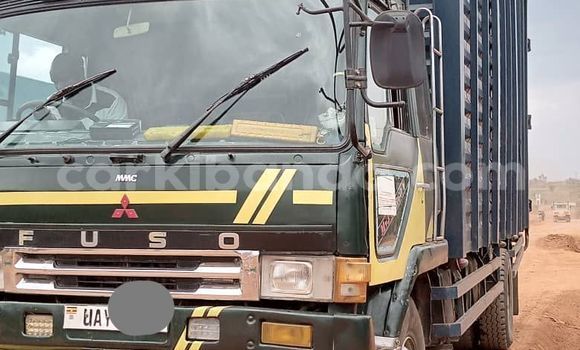 Gura Yakoze Mitsubishi Lancer Cargo White Imodoka i Kampala mu Uganda Gura Yakoze Mitsubishi Lancer Cargo White Imodoka i Kampala mu Uganda