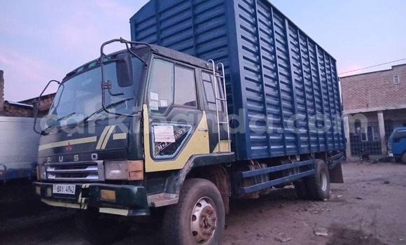 Gura Yakoze Mitsubishi Lancer Cargo White Imodoka i Kampala mu Uganda Gura Yakoze Mitsubishi Lancer Cargo White Imodoka i Kampala mu Uganda