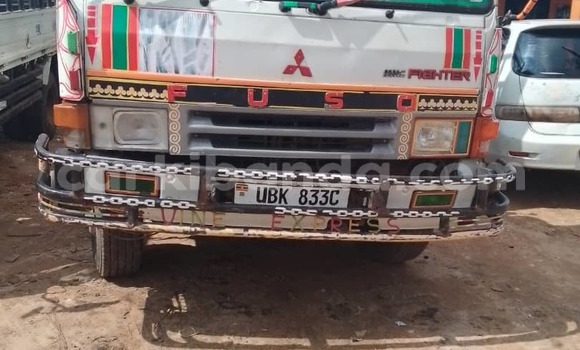 Gura Yakoze Mitsubishi Lancer Cargo White Imodoka i Kampala mu Uganda Gura Yakoze Mitsubishi Lancer Cargo White Imodoka i Kampala mu Uganda