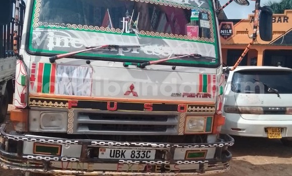 Gura Yakoze Mitsubishi Lancer Cargo White Imodoka i Kampala mu Uganda Gura Yakoze Mitsubishi Lancer Cargo White Imodoka i Kampala mu Uganda