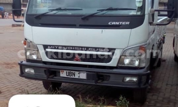 Gura Yakoze Mitsubishi Lancer Cargo White Imodoka i Kampala mu Uganda Gura Yakoze Mitsubishi Lancer Cargo White Imodoka i Kampala mu Uganda