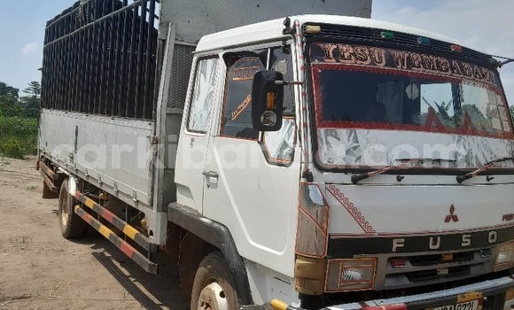 Gura Yakoze Mitsubishi Lancer Cargo White Imodoka i Kampala mu Uganda Gura Yakoze Mitsubishi Lancer Cargo White Imodoka i Kampala mu Uganda