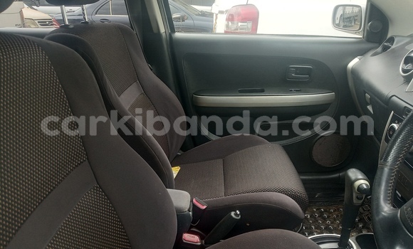 Gura Yakoze Toyota IST White Imodoka i Kampala mu Uganda Gura Yakoze Toyota IST White Imodoka i Kampala mu Uganda