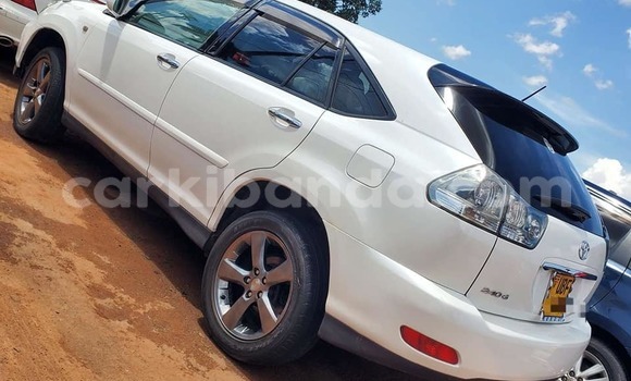 Gura Yakoze Toyota Harrier White Imodoka i Arua mu Uganda Gura Yakoze Toyota Harrier White Imodoka i Arua mu Uganda