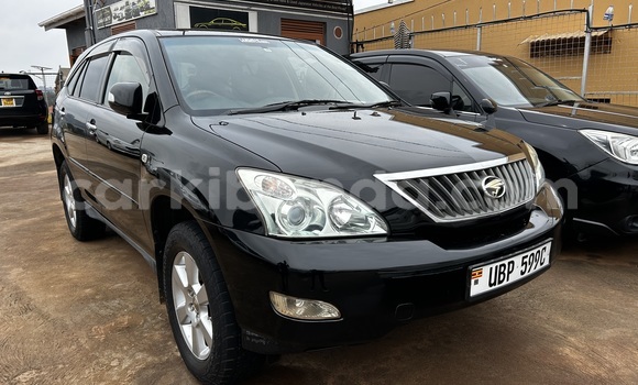 Gura Yakoze Toyota Harrier Black Imodoka i Kampala mu Uganda