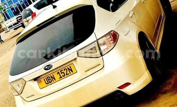Gura Yakoze Toyota Ipsum White Imodoka i Kampala mu Uganda Gura Yakoze Toyota Ipsum White Imodoka i Kampala mu Uganda