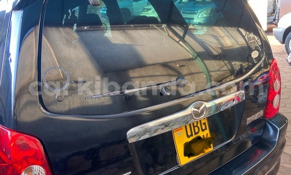 Gura Yakoze Mazda Tribute Black Imodoka i Kampala mu Uganda