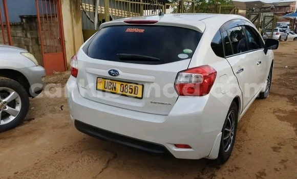 Gura Yakoze Toyota Ipsum White Imodoka i Bugiri mu Eastern Gura Yakoze Toyota Ipsum White Imodoka i Bugiri mu Eastern