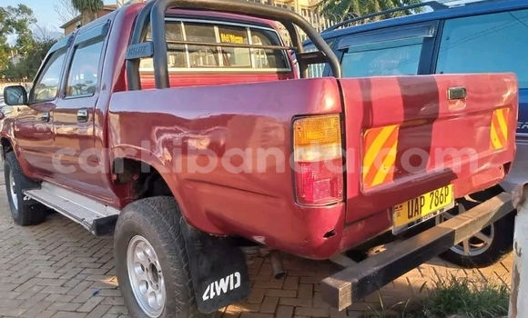Buy Used Toyota Hilux Red Car in Bugembe in Eastern