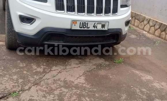 Gura Yakoze Jeep Cherokee White Imodoka i Kampala mu Uganda