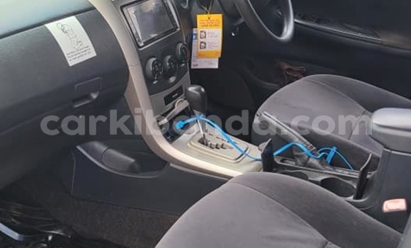 Gura Yakoze Toyota Fielder Black Imodoka i Kampala mu Uganda Gura Yakoze Toyota Fielder Black Imodoka i Kampala mu Uganda