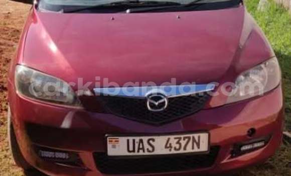 Gura Yakoze Mazda Demio Red Imodoka i Kampala mu Uganda Gura Yakoze Mazda Demio Red Imodoka i Kampala mu Uganda