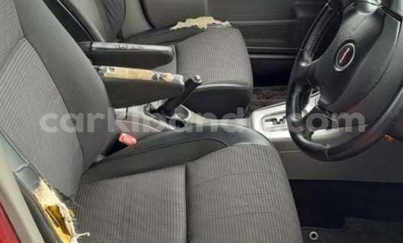 Gura Yakoze Subaru Impreza Red Imodoka i Kampala mu Uganda Gura Yakoze Subaru Impreza Red Imodoka i Kampala mu Uganda