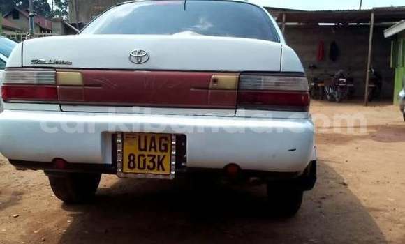 Gura Yakoze Kia Avella White Imodoka i Bugiri mu Eastern Gura Yakoze Kia Avella White Imodoka i Bugiri mu Eastern