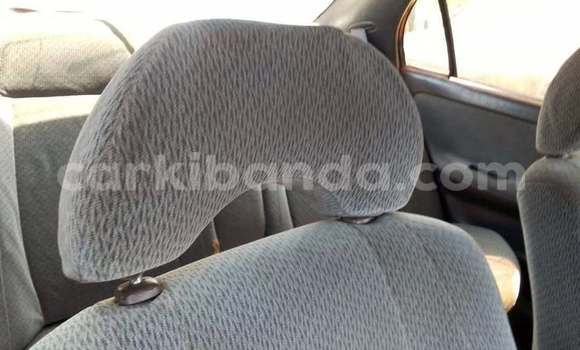 Gura Yakoze Kia Avella White Imodoka i Bugiri mu Eastern Gura Yakoze Kia Avella White Imodoka i Bugiri mu Eastern