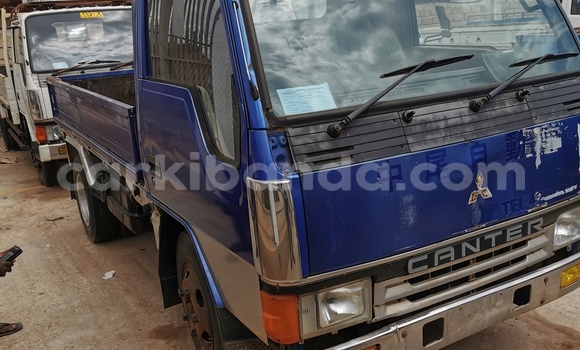 Gura Imported Mitsubishi Lancer Cargo White Imodoka i Kampala mu Uganda