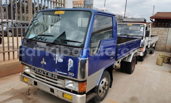 Buy Import Mitsubishi Lancer Cargo White Car in Kampala in Uganda Buy Import Mitsubishi Lancer Cargo White Car in Kampala in Uganda