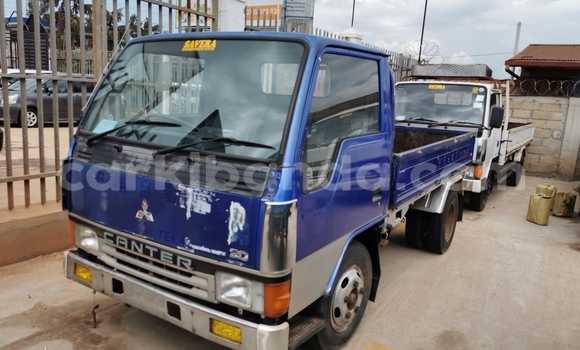 Buy Import Mitsubishi Lancer Cargo White Car in Kampala in Uganda Buy Import Mitsubishi Lancer Cargo White Car in Kampala in Uganda