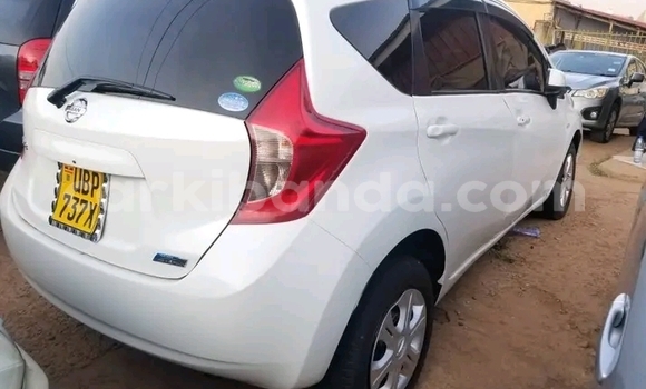 Gura Yakoze Nissan Note White Imodoka i Bugembe mu Eastern Gura Yakoze Nissan Note White Imodoka i Bugembe mu Eastern