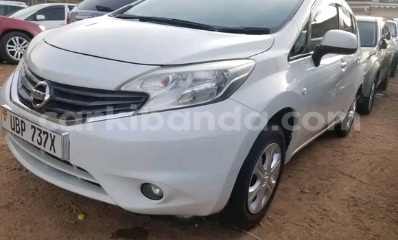 Gura Yakoze Nissan Note White Imodoka i Bugembe mu Eastern Gura Yakoze Nissan Note White Imodoka i Bugembe mu Eastern