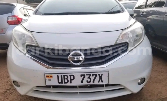 Gura Yakoze Nissan Note White Imodoka i Bugembe mu Eastern Gura Yakoze Nissan Note White Imodoka i Bugembe mu Eastern