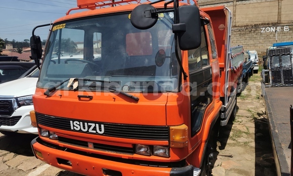 Buy Import Isuzu FTR 850 Red Truck in Kampala in Uganda
