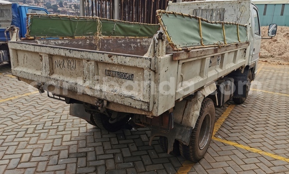 Buy Import Isuzu FTR 850 White Truck in Kampala in Uganda Buy Import Isuzu FTR 850 White Truck in Kampala in Uganda