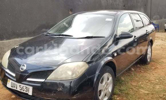 Gura Yakoze Nissan Primera Black Imodoka i Kampala mu Uganda