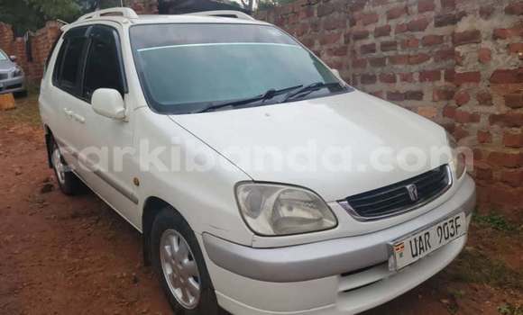 Buy Used Toyota Raum White Car in Kampala in Uganda