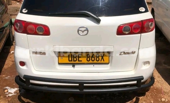 Gura Yakoze Mazda Spiano White Imodoka i Arua mu Uganda Gura Yakoze Mazda Spiano White Imodoka i Arua mu Uganda