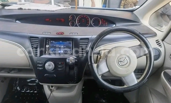 Gura Yakoze Mazda Biante White Imodoka i Bugiri mu Eastern Gura Yakoze Mazda Biante White Imodoka i Bugiri mu Eastern