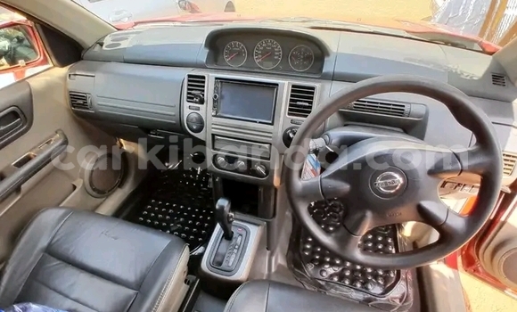 Gura Yakoze Nissan X–Trail Red Imodoka i Bundibugyo mu Western Gura Yakoze Nissan X–Trail Red Imodoka i Bundibugyo mu Western