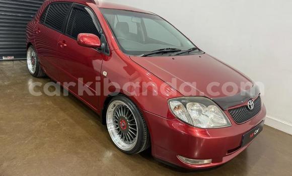 Gura Yakoze Toyota Runx Red Imodoka i Kampala mu Uganda