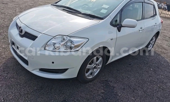 Buy Import Toyota Auris White Car in Kampala in Uganda
