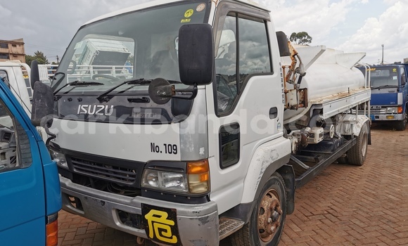 Buy Import Isuzu FTR 850 White Truck in Kampala in Uganda Buy Import Isuzu FTR 850 White Truck in Kampala in Uganda