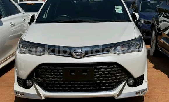 Gura Yakoze Toyota Fielder White Imodoka i Kampala mu Uganda Gura Yakoze Toyota Fielder White Imodoka i Kampala mu Uganda