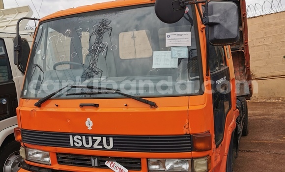 Buy Import Isuzu FTR 850 Red Truck in Kampala in Uganda