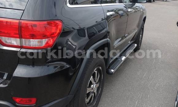 Gura Yakoze Jeep Grand Cherokee Black Imodoka i Kampala mu Uganda Gura Yakoze Jeep Grand Cherokee Black Imodoka i Kampala mu Uganda