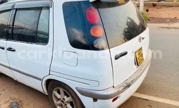 Buy Used Toyota Raum White Car in Kampala in Uganda Buy Used Toyota Raum White Car in Kampala in Uganda