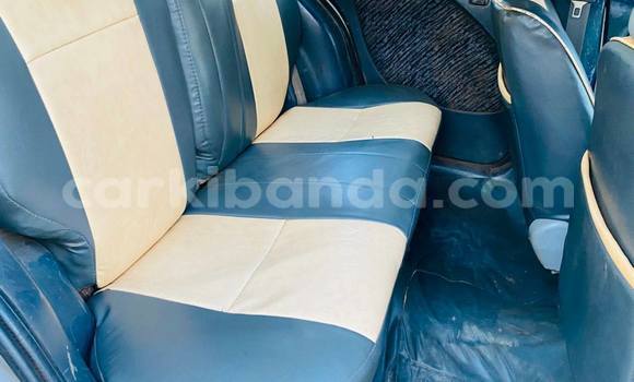 Buy Used Toyota Raum White Car in Kampala in Uganda Buy Used Toyota Raum White Car in Kampala in Uganda