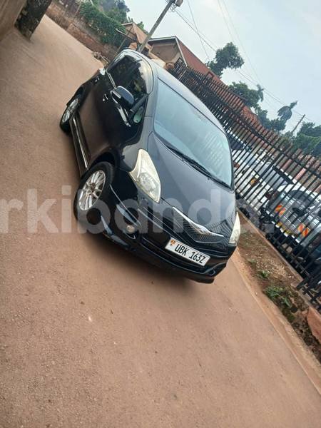 Big with watermark toyota ractis uganda kampala 24873